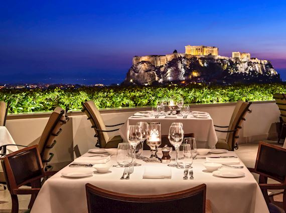 GB roof garden restaurant at night with views to the acropolis