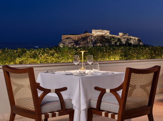 GB roof garden restaurant at night with views to the acropolis